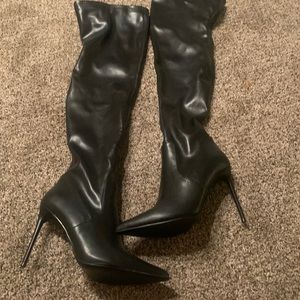 Never worn above the knee boots.